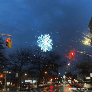 Fulton Street holiday lights snowflake at night