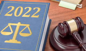 Gavel and legal book with "2022" on the front