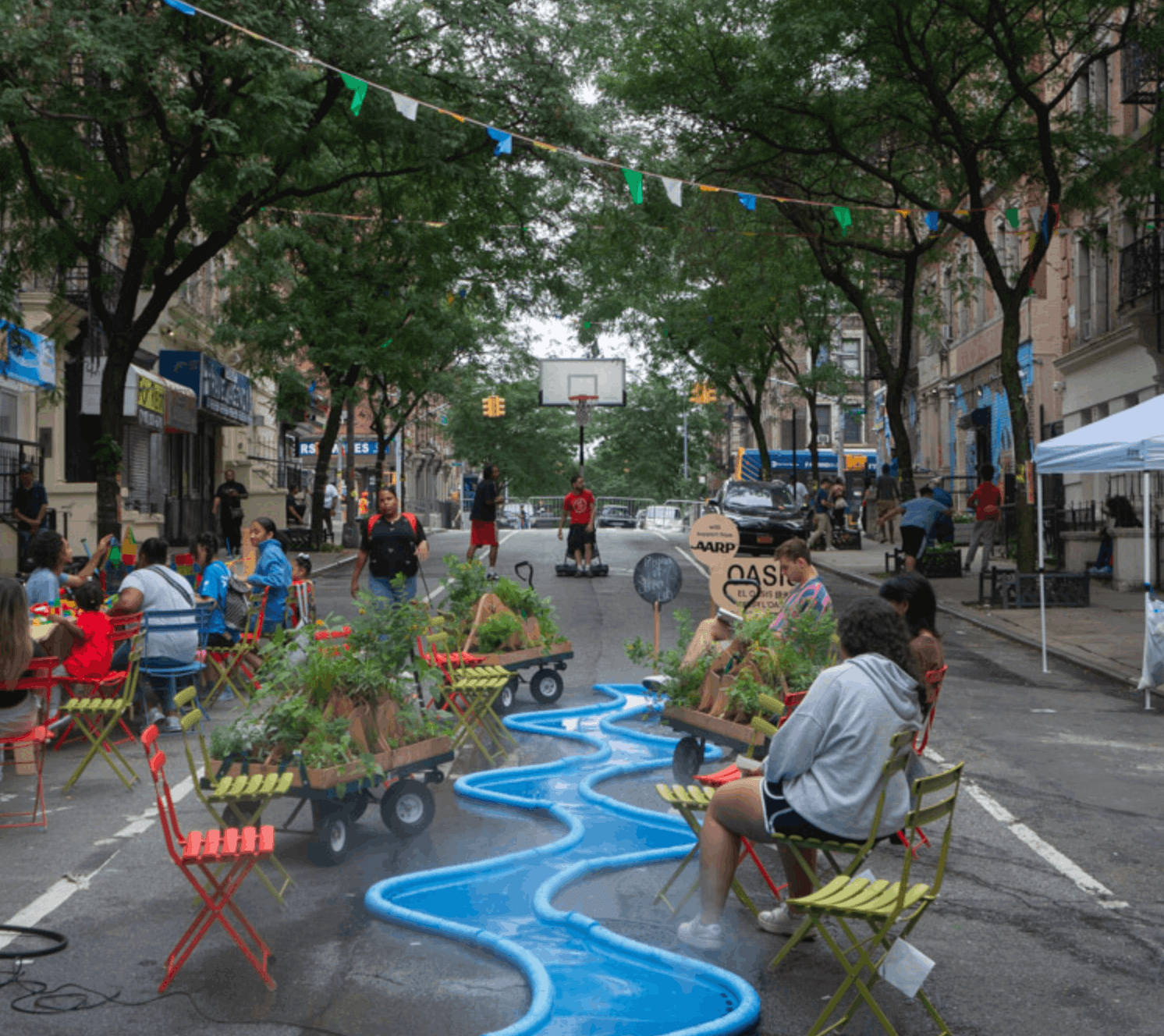 Photo showing people in Open Streets using Oasis water feature